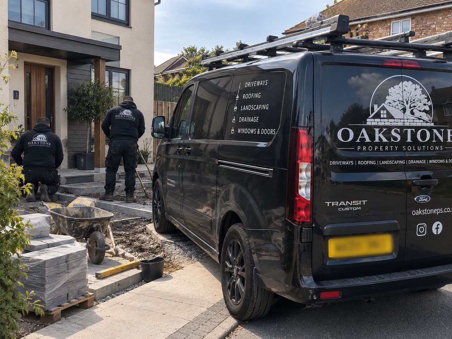 OakStone Property Solutions team working on a driveway beside a branded van