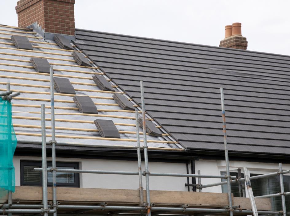 House roof mid-replacement with new membrane, battens and tiles