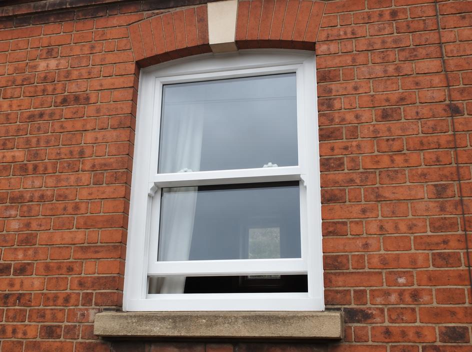 White sliding sash window on a Victorian terrace